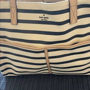 Kate Spade navy and cream Striped Tote with tan leather accents. Never used